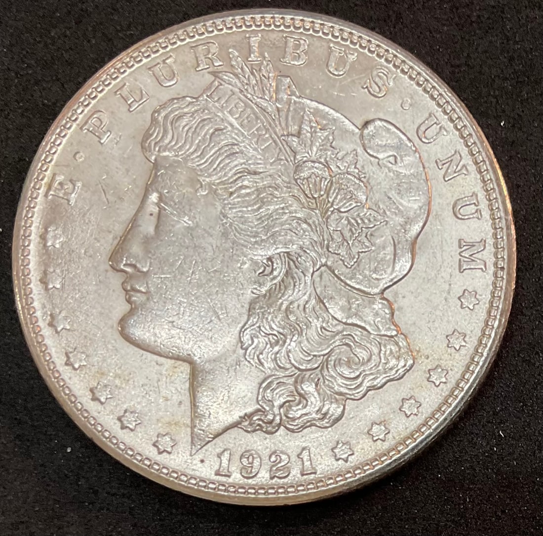 1921 S Morgan Silver Dollar: 1921 S Morgan Silver Dollar, with Protective Plastic Holder, Condition, see photographs.