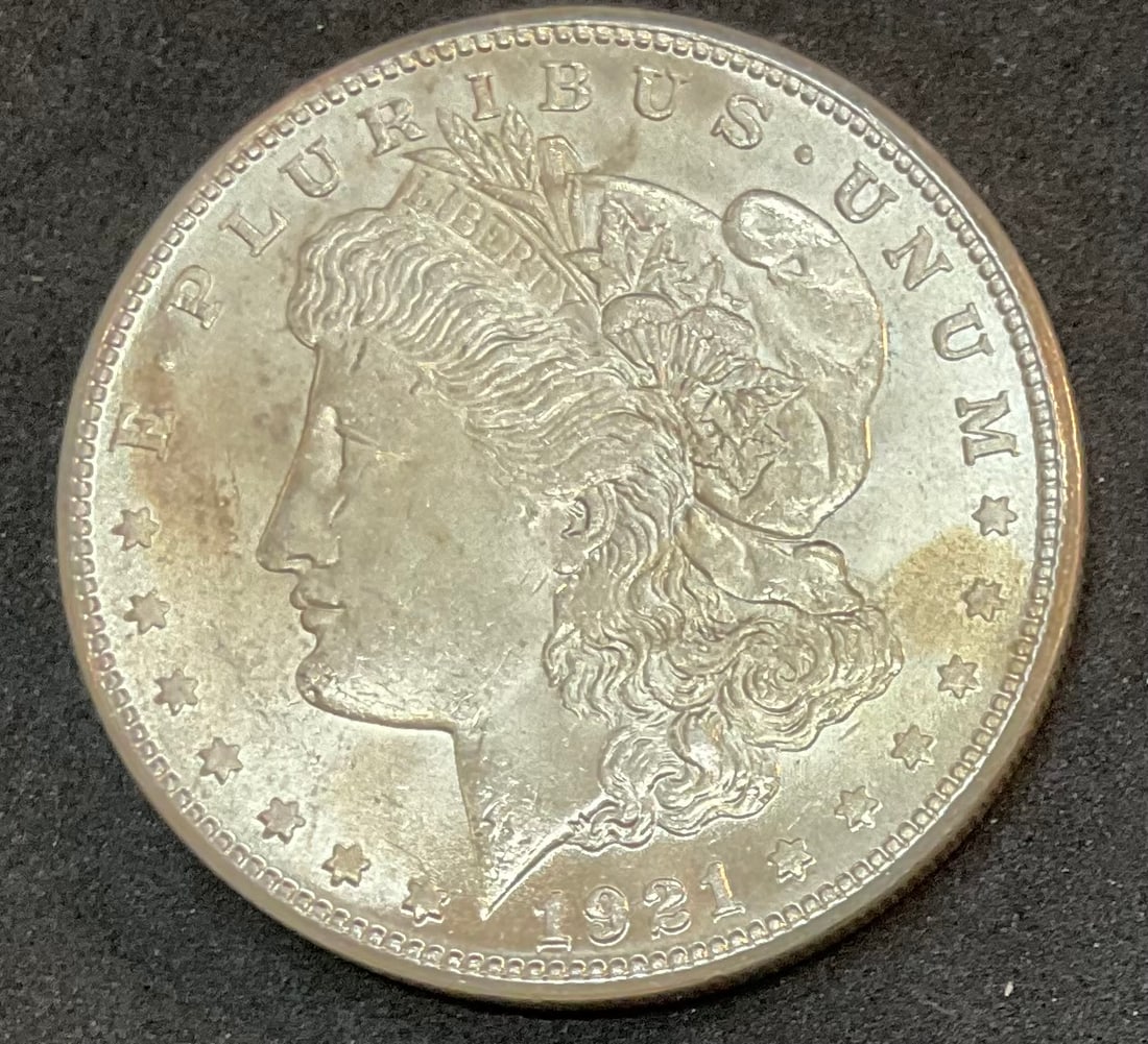 1921 S Morgan Silver Dollar: 1921 S Morgan Silver Dollar, with Protective Plastic Holder, Condition, see photographs.