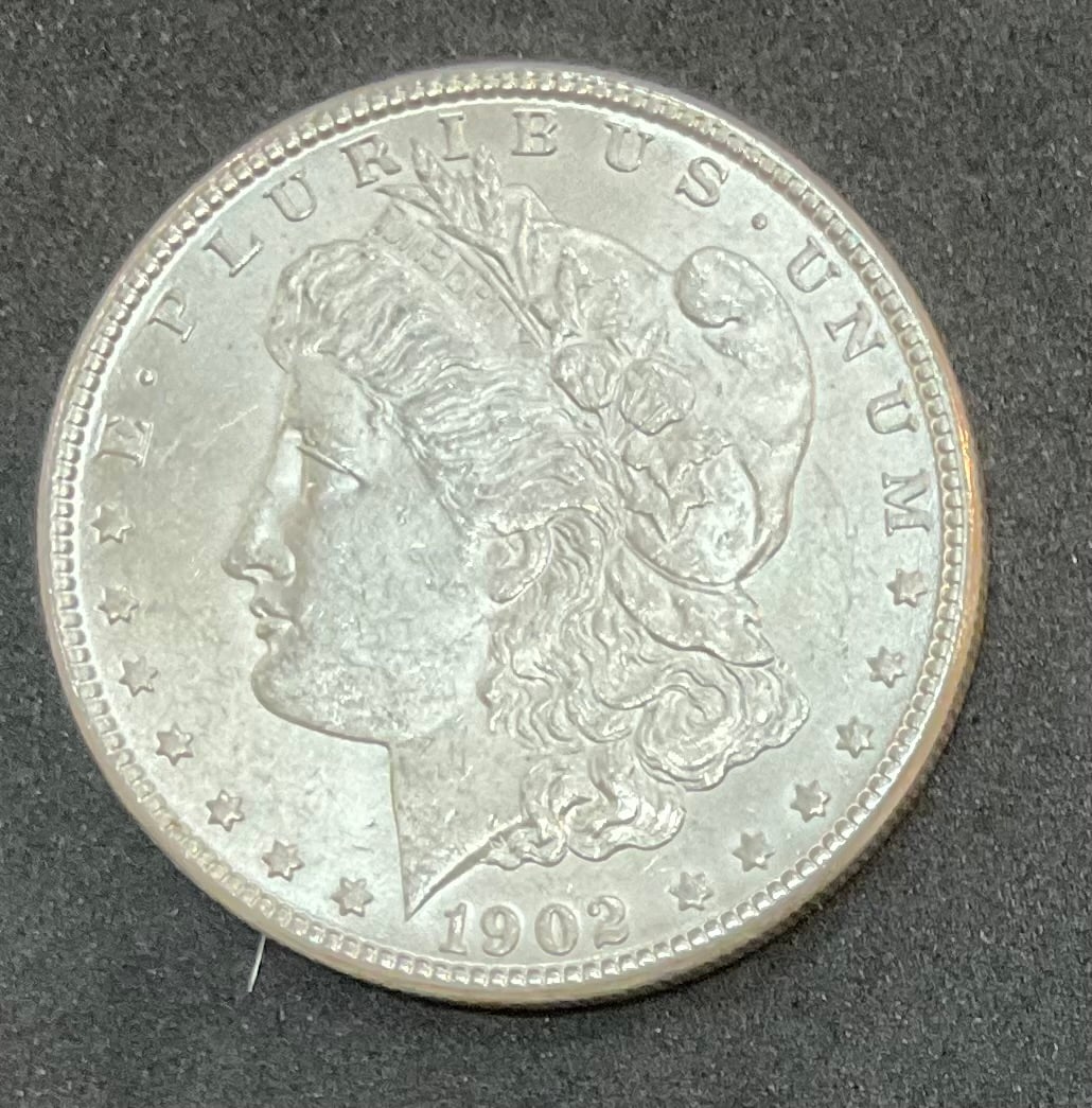 1902 O Morgan Silver Dollar: 1902 O Morgan Silver Dollar, Condition, see photographs.