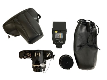 Nikon FM Black SLR 35mm Film Camera JAPAN with Nikon 50 mm Lens and Accessories
