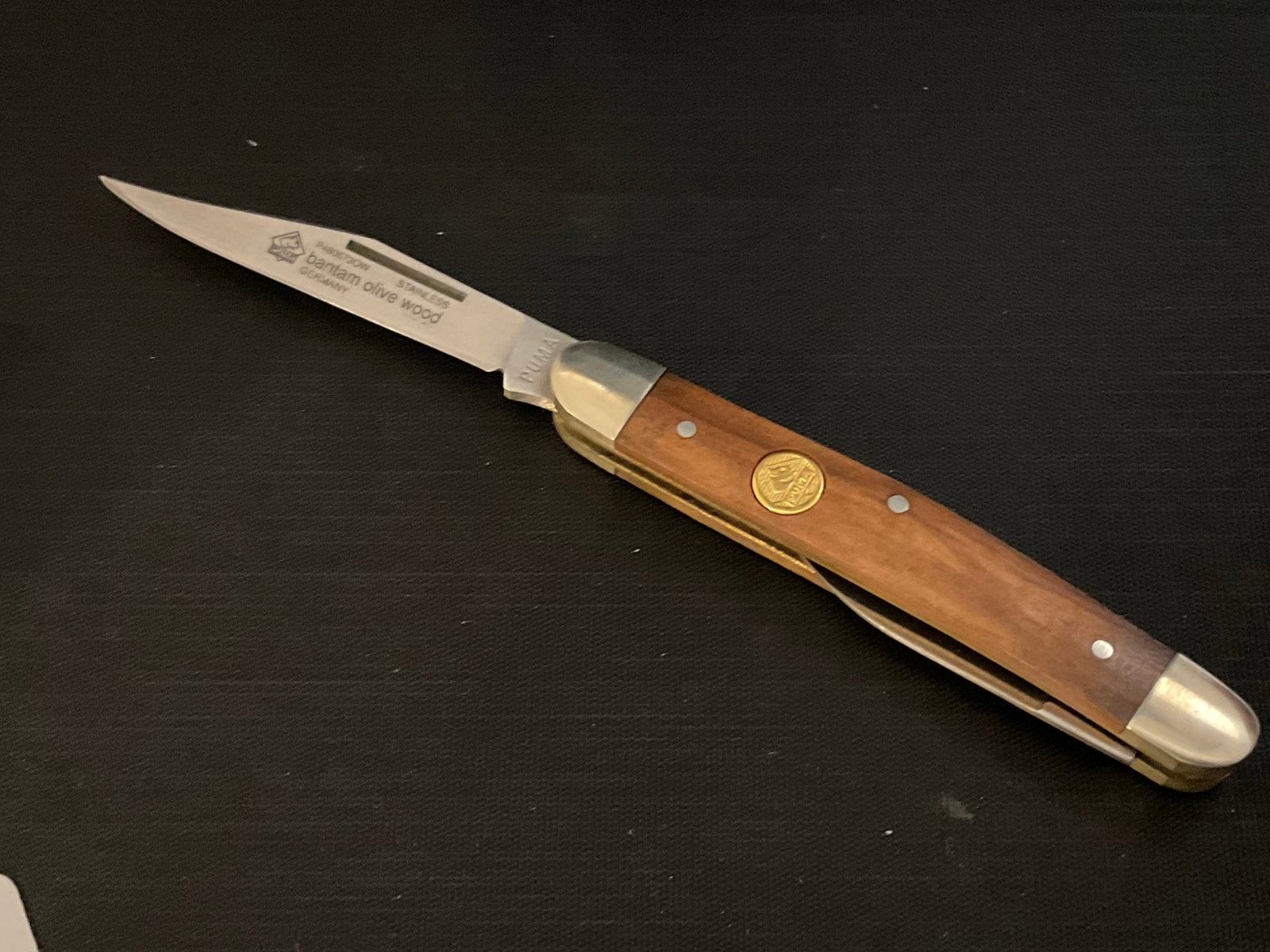 Puma P480673 Bantam Olive Wood 2-Blade Pocket Knife: Puma P480673 Bantam Olive Wood 2-Blade Pocket Knife, with box, Condition, see photographs.