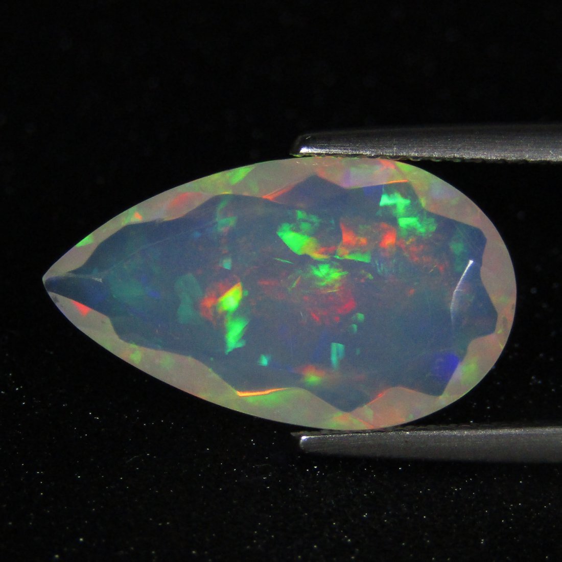 11.90CTS MARVELOUS NATURAL WHITE OPAL PEAR SHAPE CUT GEM (1 of 5)