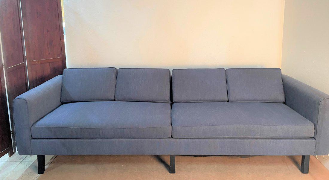 Mid Century Modern Sofa: Mid Century Modern Sofa. Loose cushioned sears. Black lacquered legs. Measures: 30H x 101.5W x 35.5D.
