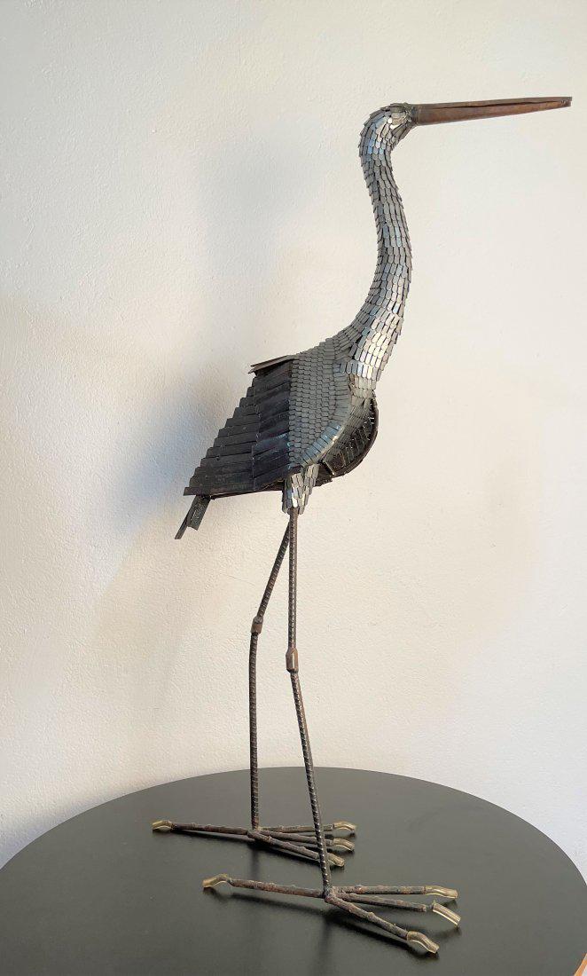 Silver Metal Crane Bird Sculpture: Silver Metal Crane Bird Sculpture. Measures: 38H x 11.5W x 22D