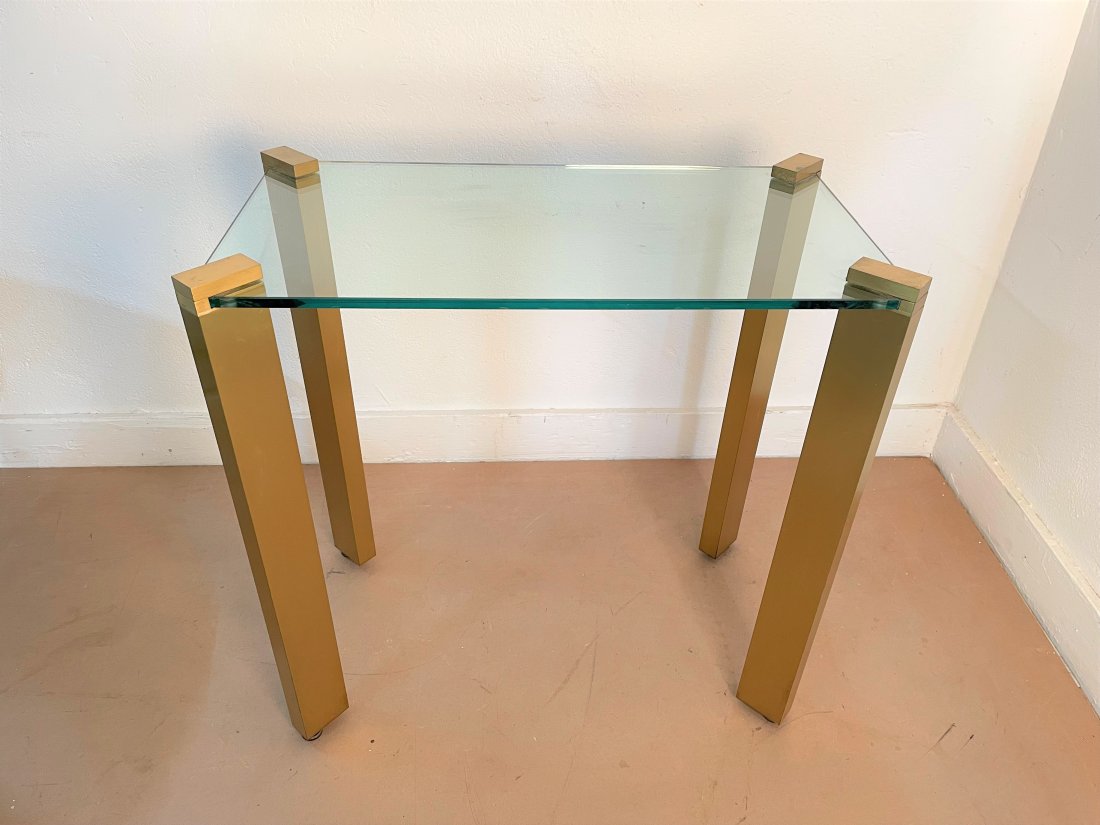 Brass and Glass Console Table: Brass and Glass Console Table. Measures: 30H x 31W x 17D.