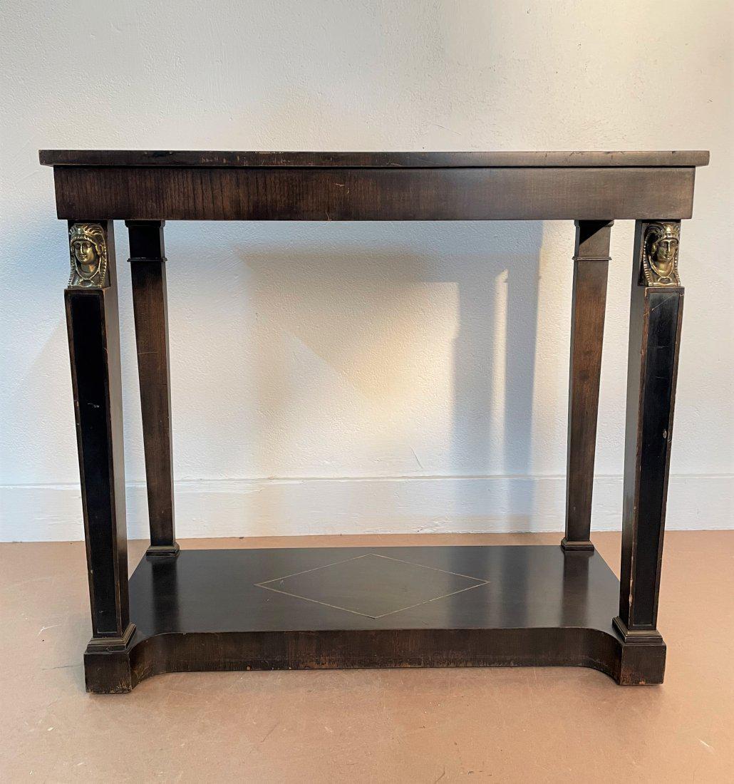 Empire Style Console: Console is wood with brass faces to the top. Measures: