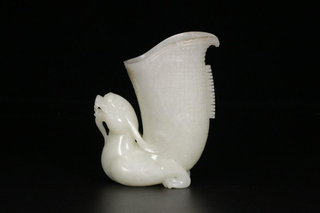 A Hetian Jade 'Dragon Head' Vessel (1 of 9)