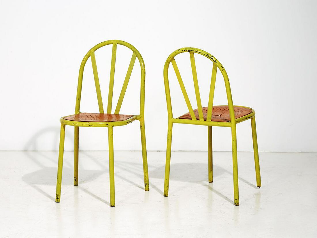 ROBERT MALLET-STEVENS (ATTRIBUÉ A) & TUBOR (COMMUNÉMENT ATTRIBUÉ A)Suite de douze: ROBERT MALLET-STEVENS (ATTRIBUÃ‰ A) & TUBOR (COMMUNÃ‰MENT ATTRIBUÃ‰ A)Suite de douze chaises en tube laquÃ© jaune Ã dossier arrondi ajourÃ© de trois lames plates rayonnantes et assise
