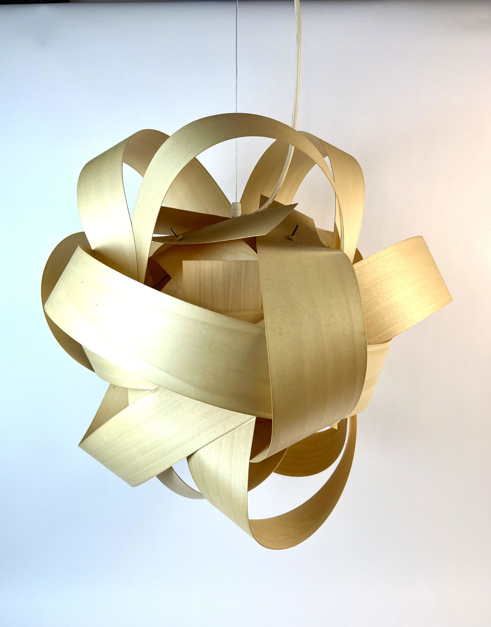 Santa & Cole Leonardo Ribbon Hanging Fixture: Birch wood ribbon chandelier designed by Antoni Arola in 2003. Light retails for $2400. Measures 24" x 24"