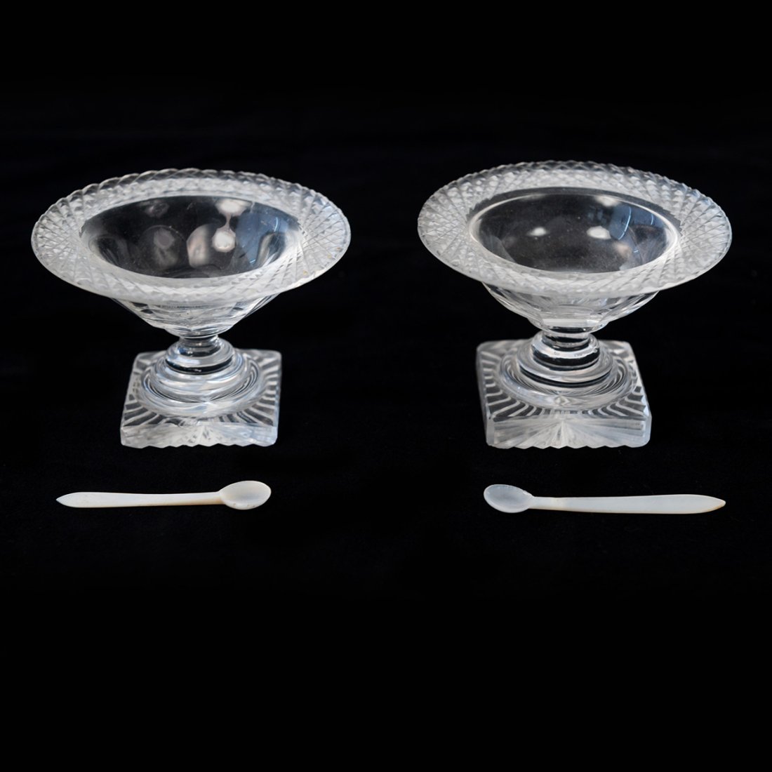 Pair of Vintage Flint Glass Pedestal Salts with Shell Spoons: measuring 3.25" round x 2.5" high