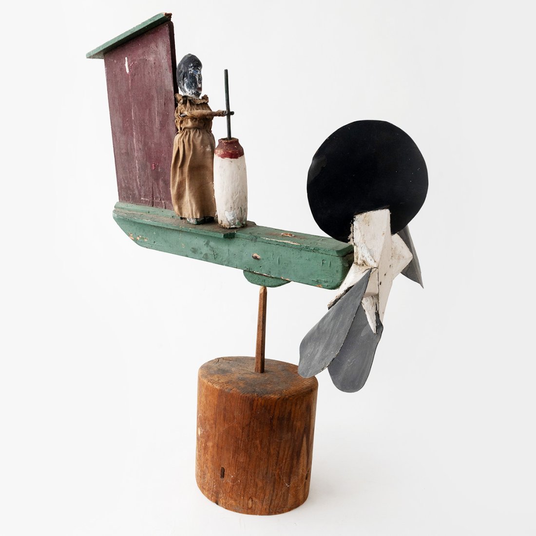 Primitive Folk Art Butter Churn Maid Whirligig: signs of normal wear from age arms move up and down as wind spins the wheelmeasures approximately 19.5" wide x 28" high
