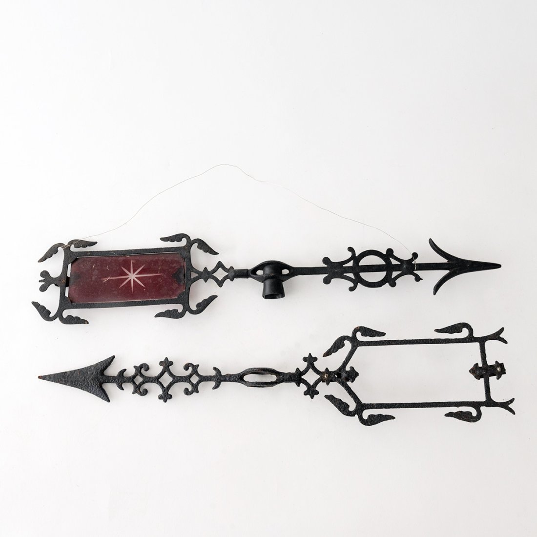 Pair of Wrought Iron Bannerette-Arrow Weather Vane: Pair of Wrought Iron Bannerette-Arrow Weather Vane. One of the weather vanes has its original inserted rectangular red glass panel with etched bursting star pattern.