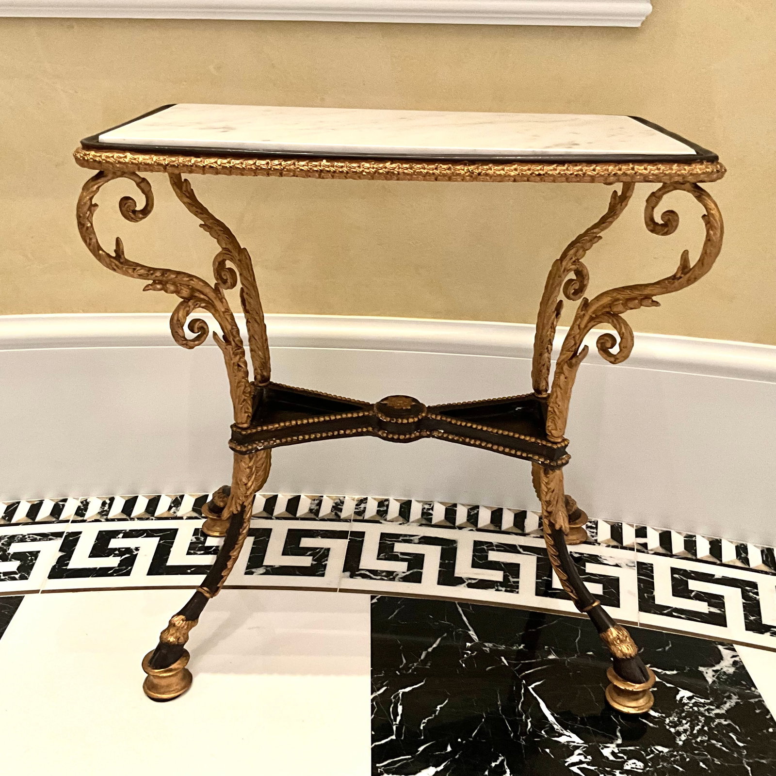 Wrought Iron Marble Top Egyptian Revival Style Hoof Feet Table: Measures: 23.5" wide x 24" high x 13" deep