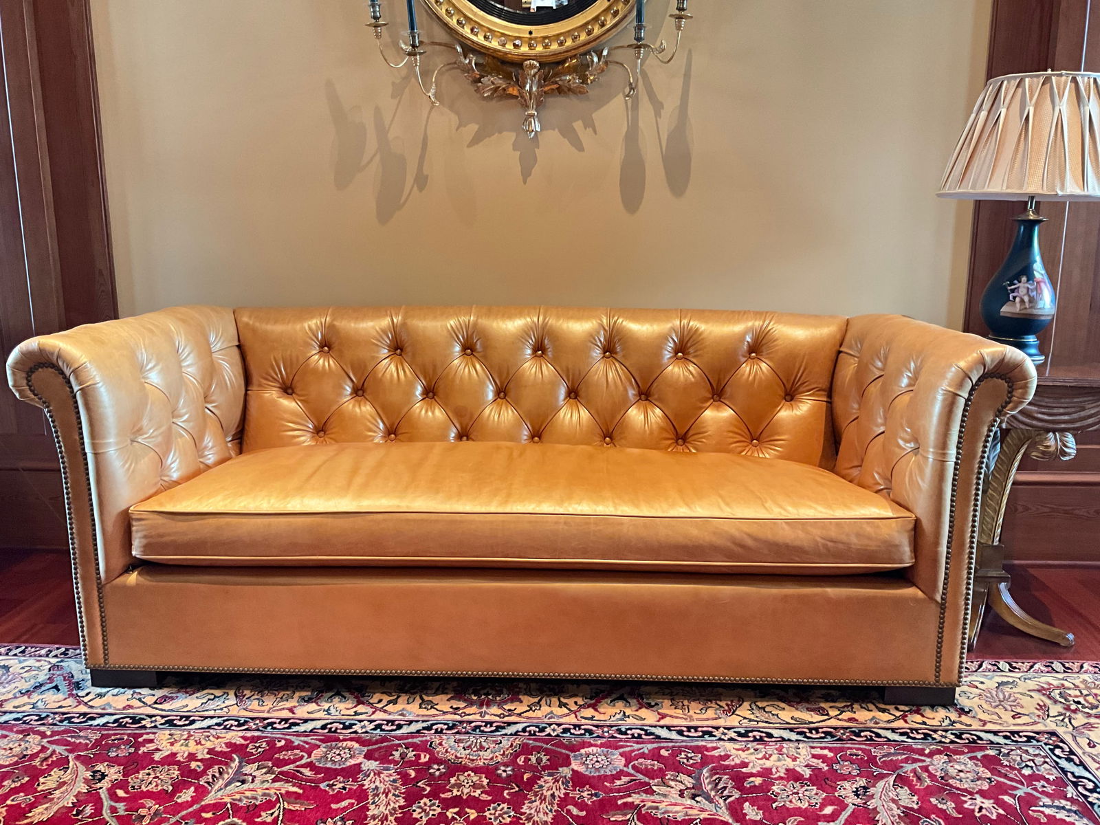 Gold Leather Chesterfield Sofa: measuring 6'11" wide x 36" deep x 32" high x 24" seat depth x 18" seat height