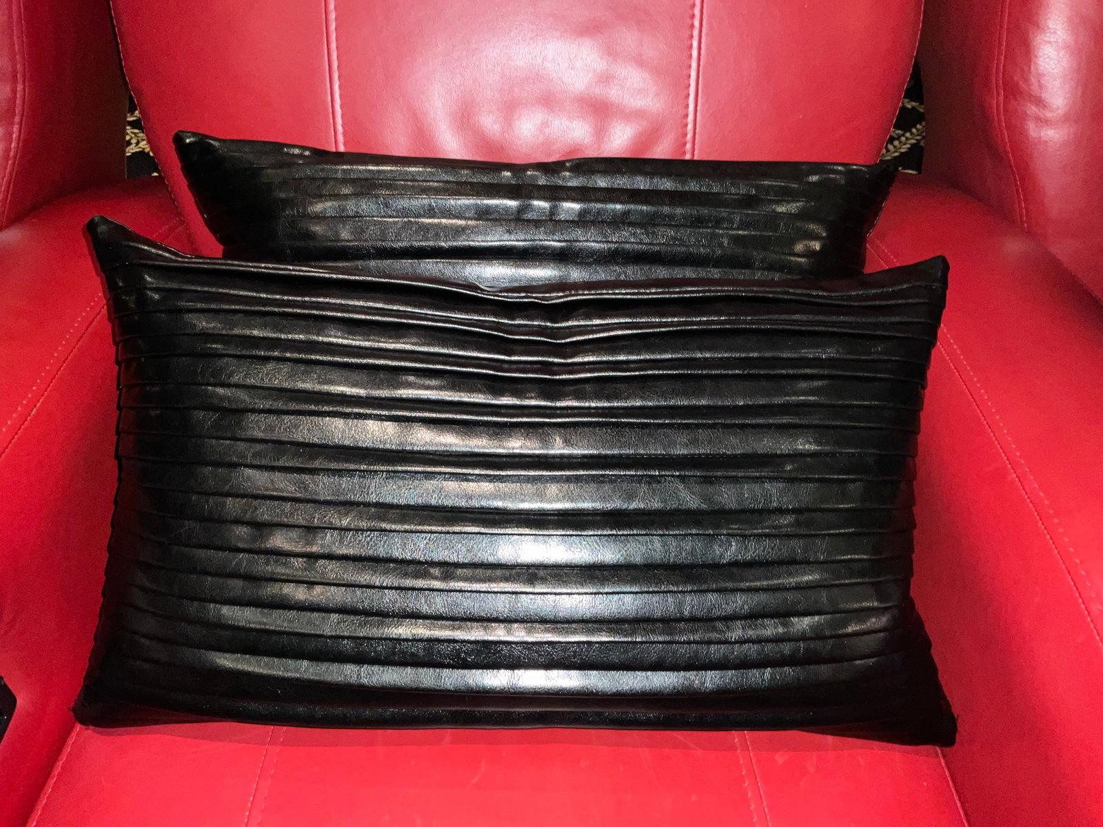 Pair of Black Leather Pleated Down Pillow by Barclay Butera: Pair of Black Leather Pleated Down Filled Pillows by Barclay Butera Measuring 21" wide x 12" high