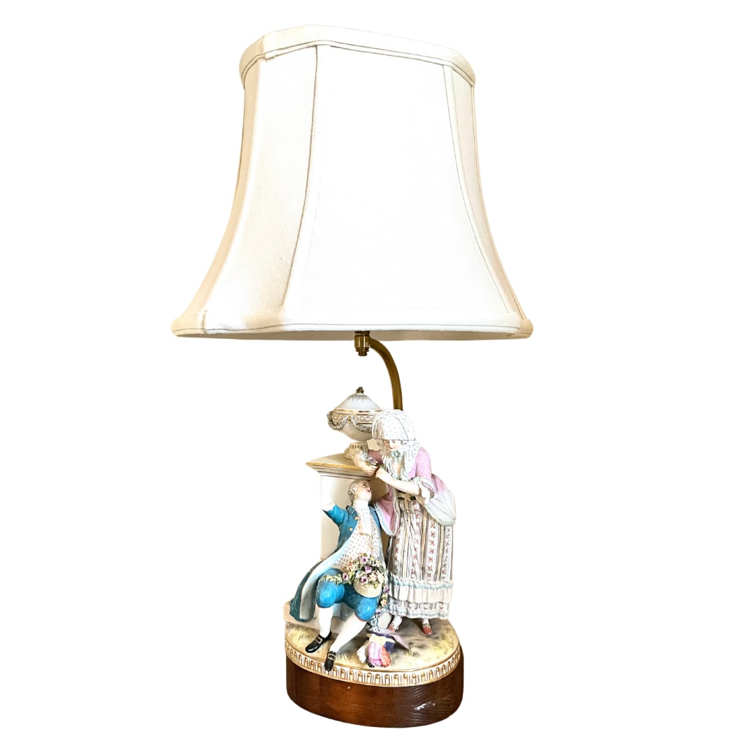 Meissen Porcelain Lamp (AS-IS): This lamp has one broken arm on the gentleman figurelamp itself measures 22" high with shade shade isi 12" in diameter and base is 8" wide marked with Meissen cross swords