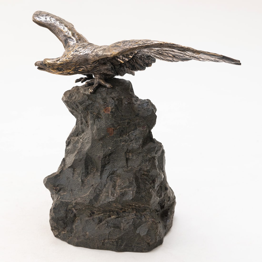 Sculptured Bronze Eagle on Stone: Measuring approximately 8.5" high x 9" wide (wing span) no signatures
