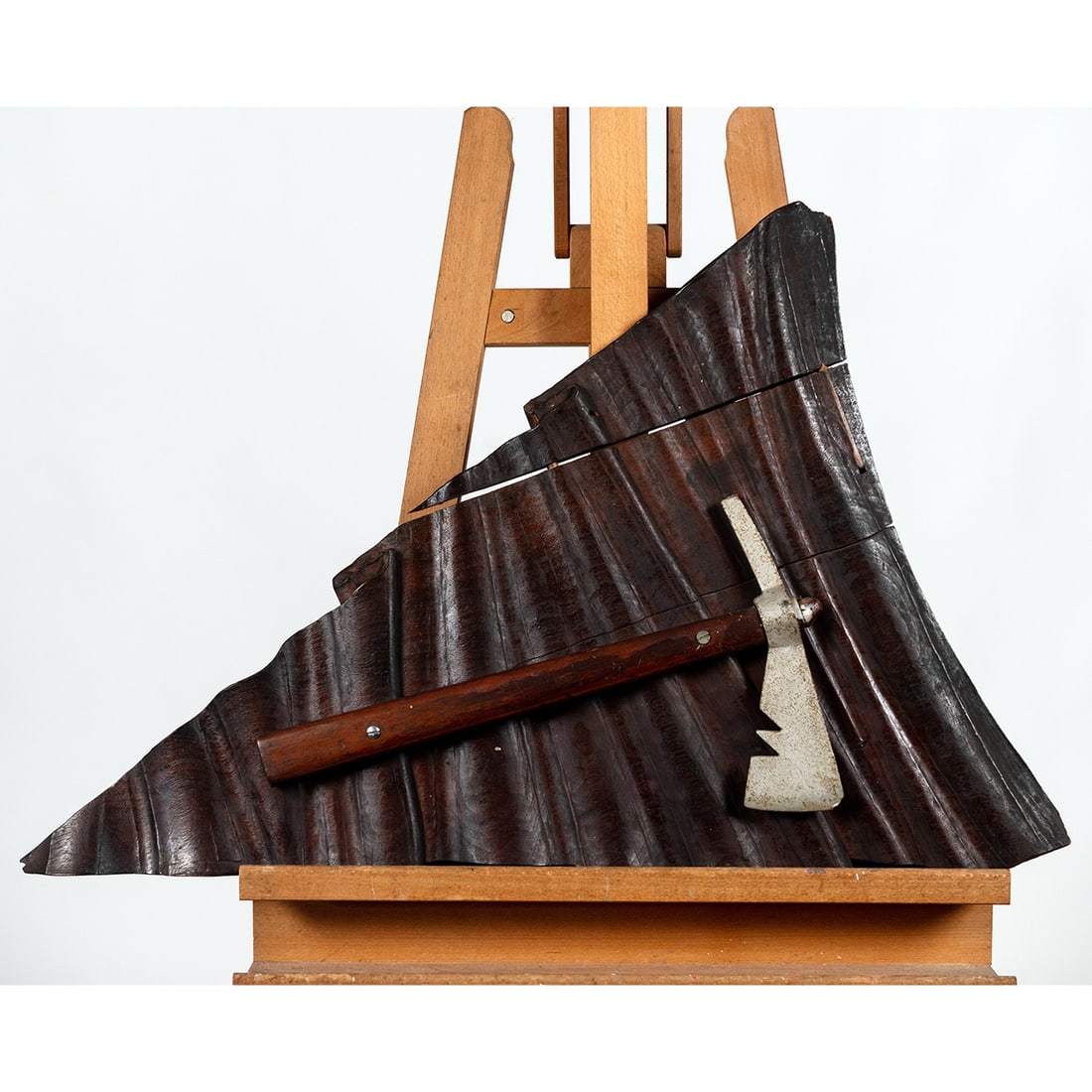 Wooden Hand Carved Flag with Tomahawk: the flag has a hanger installed on the back measuring 30.5" length x 20.25" wide and the tomahawk is 16.5" long.