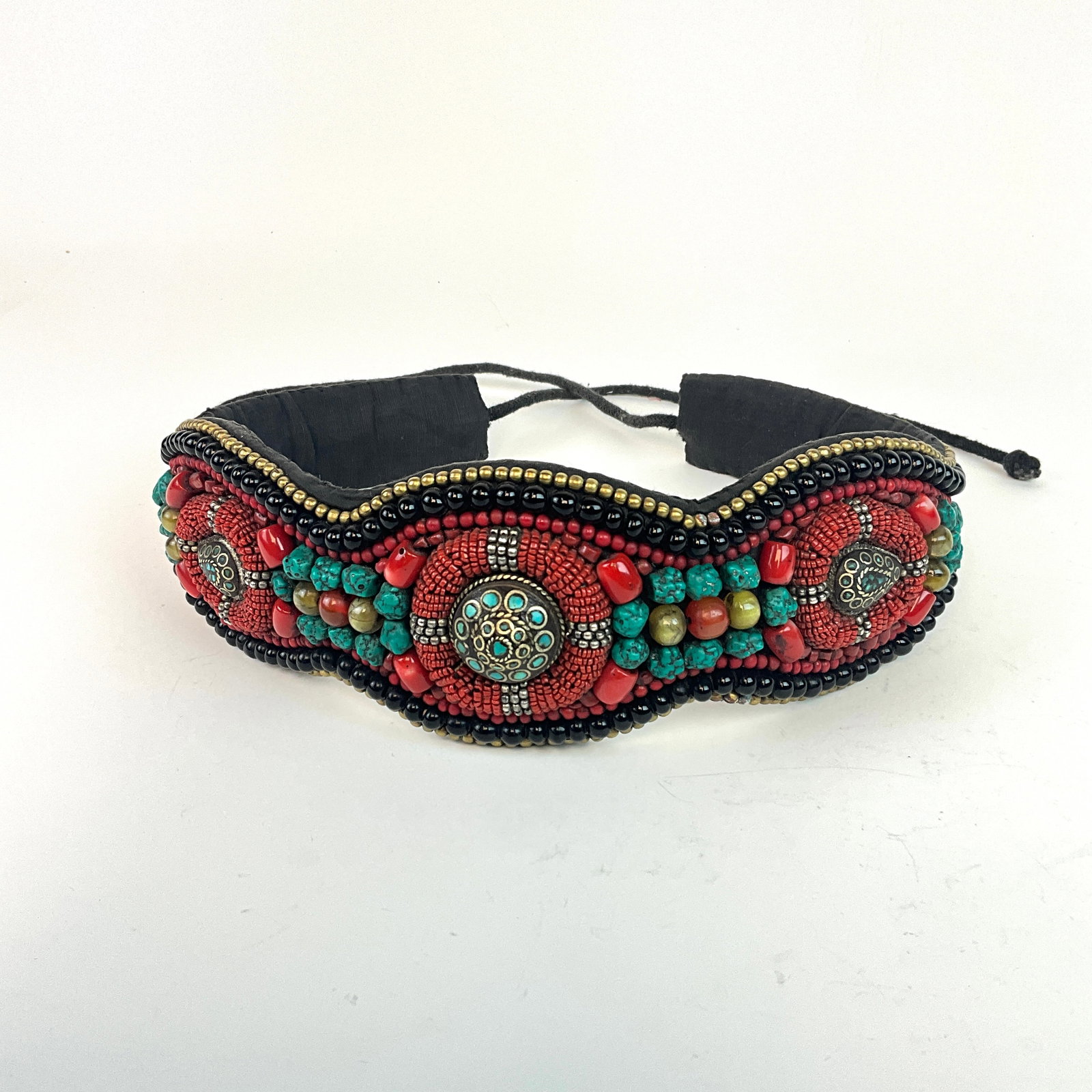 Tibetan Turquoise Belt: Tibetan turquoise belt made with coral glass beads and brass. Total length is 48 inches belt design is 24.5 inches long.