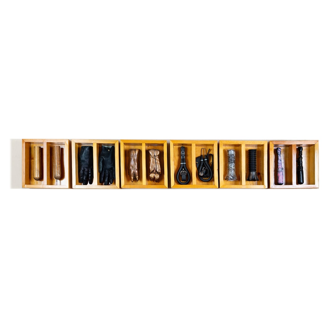 Mixed Media Assemblage Art "Extremeties"by Ernest Cox (American,1937-2024): Sculpture made from wood, bronze and mixed media. 60"wide X 10"high