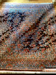 Handknotted Persian Kerman Wool Oriental Rug: Rug Size: 8' x 6.3' Country of Origin: Persian. Weave style: Handknotted, Wool. Design is all over is geometric patterns and large medallion in center