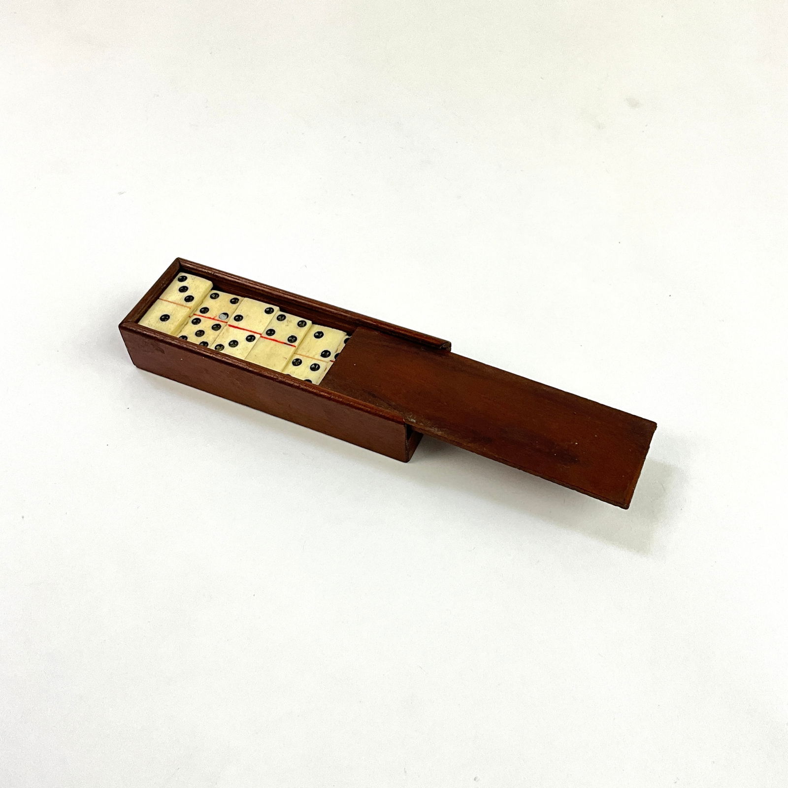 Antique Bone Domino Set In Small Wooden Box: Box measures: 3.5" long. Each domino measures: .87" long x 1.5" wide