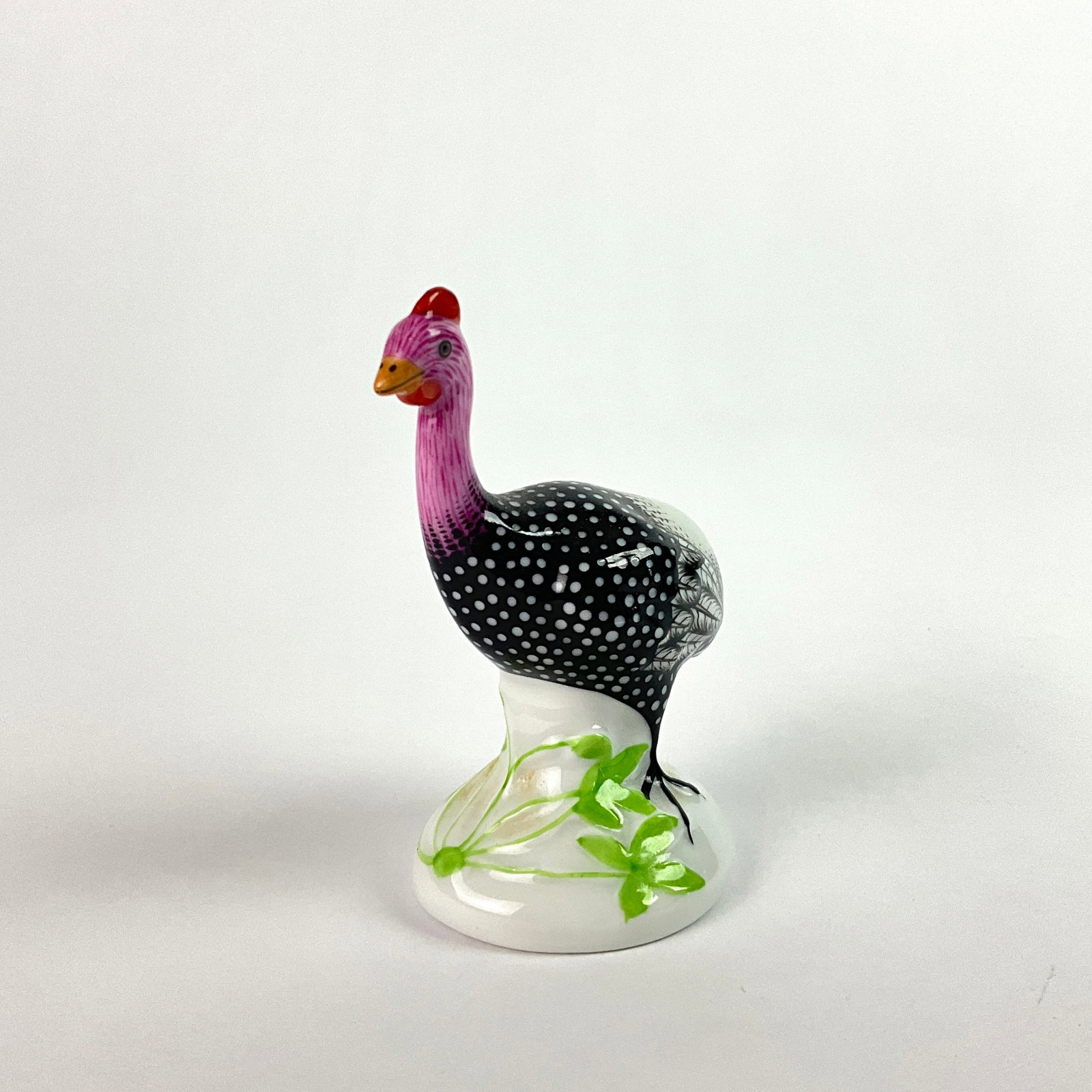 Herend Guinee Fowl Hand-painted Figurine: hand-painted black and white pattern porcelain figureSigned artist Numbered #5100Measurements:3" in height, 2" in width, 1" in depth