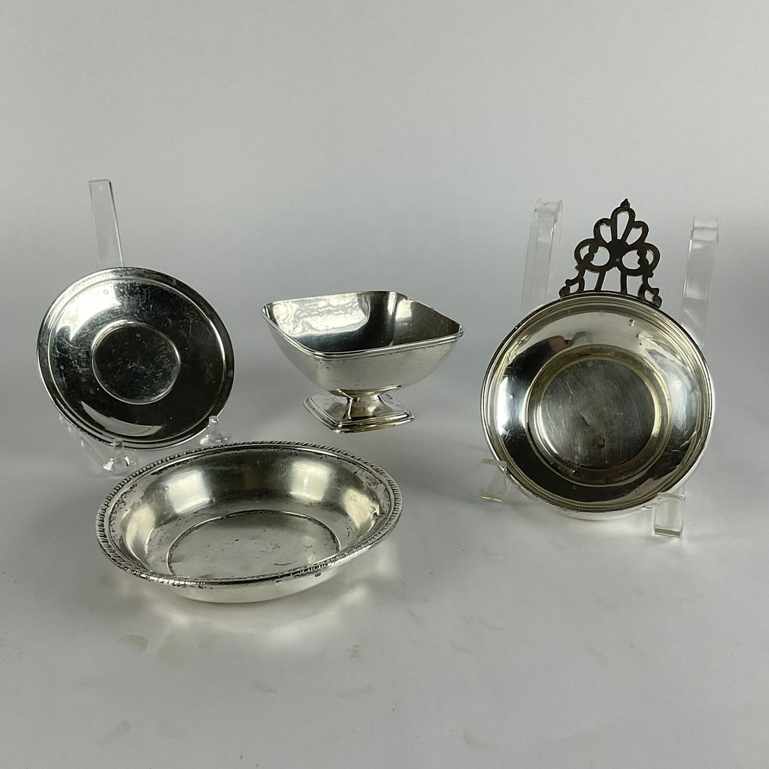 .925 Sterling Footed Snack Tray, Newport Sterling Bowl, Gorham Sterling Bowl, Sterling Snack Tray: 4.25" x 4.25" x 2.5" high square tray. 4.5" coaster. Total weight is 11 oz.