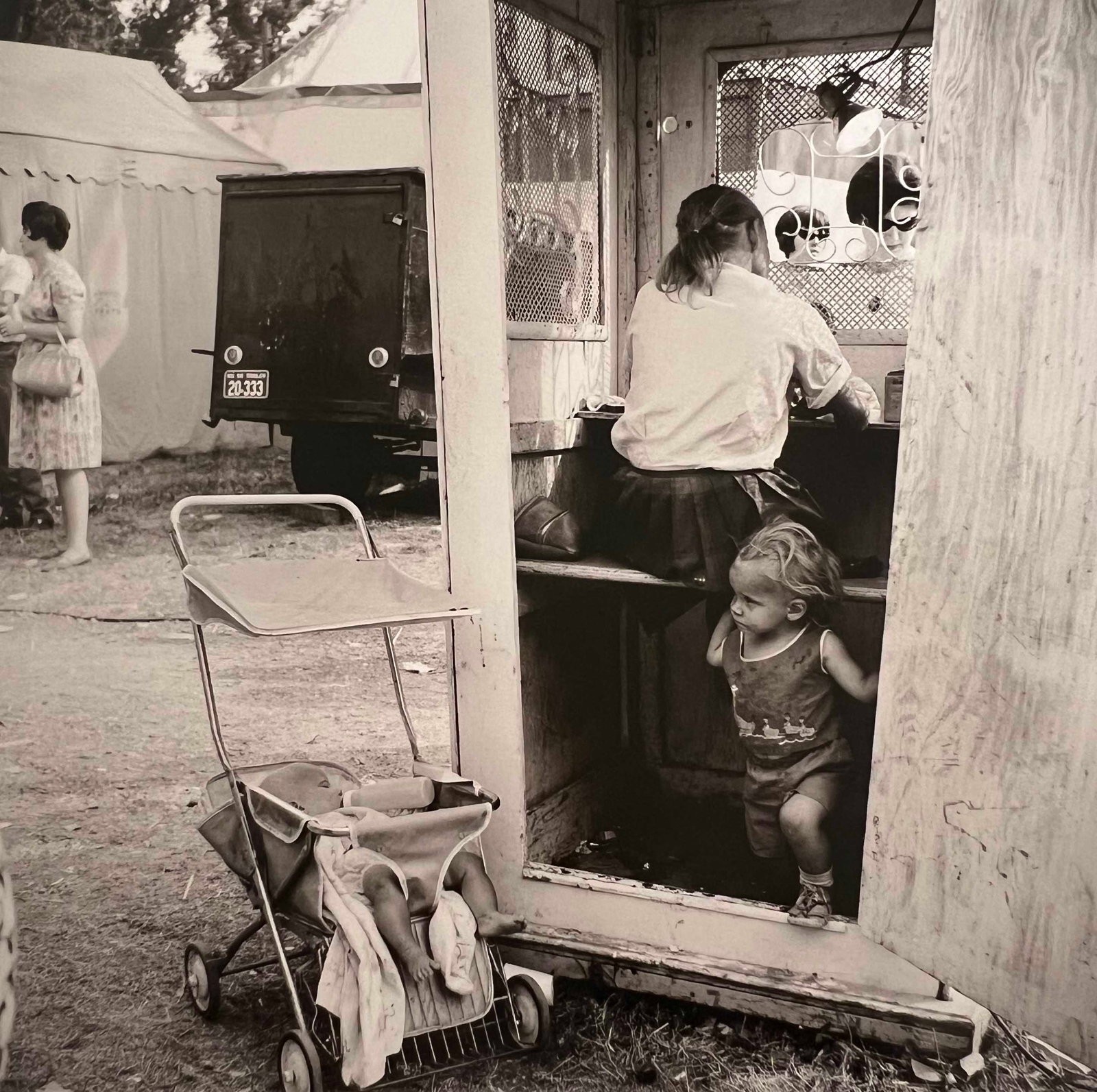 Vivian Maier, Sandwich, Illinois, September, 1966: Photographer: Vivian Dorothy Maier, (1926-2009) was an American street photographer whose work was discovered and recognized after her death. She worked for about 40 years as a nanny, mostly in Chicag