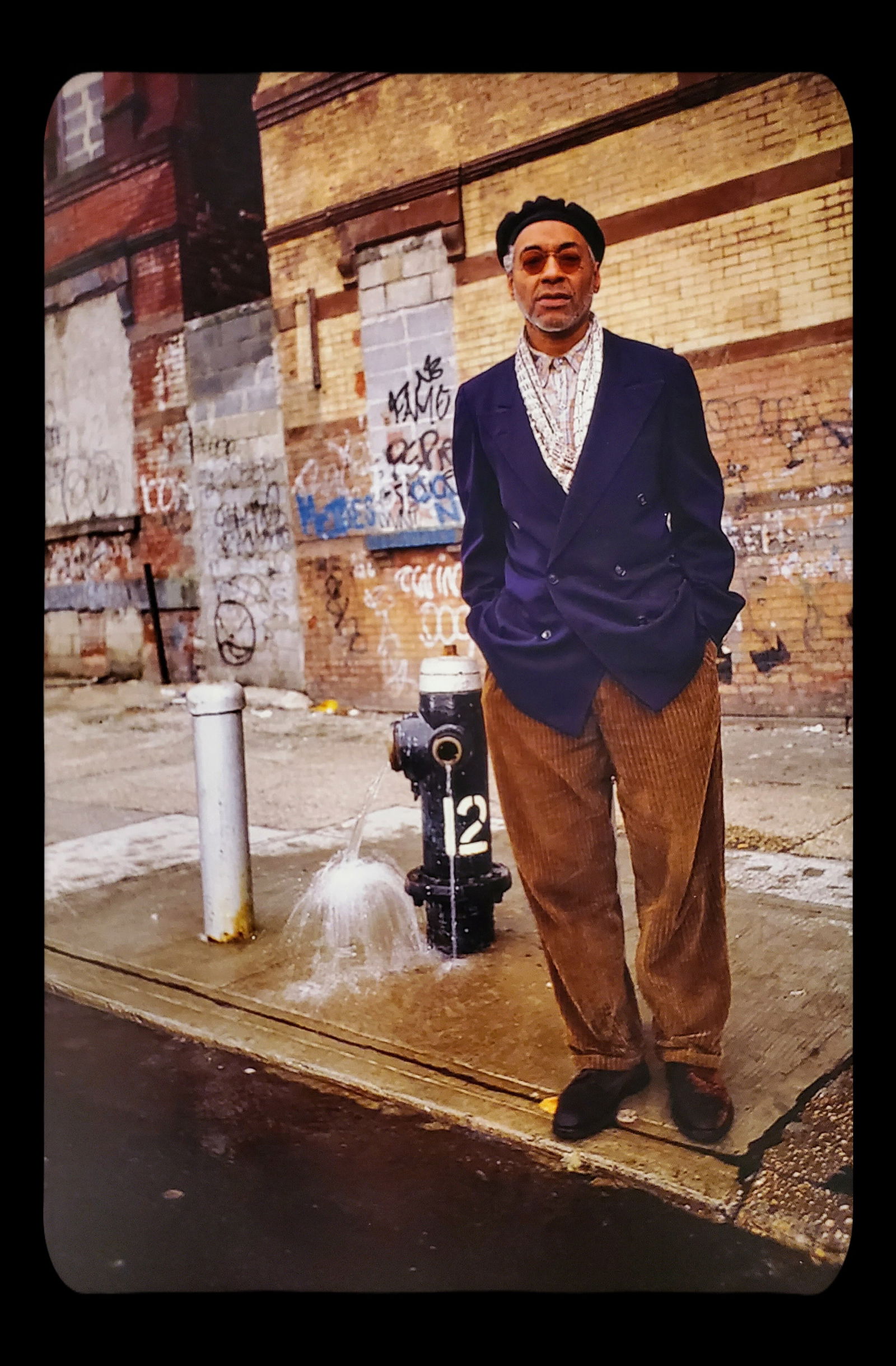 Anthony Barboza, David Hammons, Harlem, New York, 1990's: Photographer: Anthony Barboza is a photographer, historian, artist and writer. With roots originating from Cape Verde, and work that began in commercial art more than forty years ago. Title: "David Ha