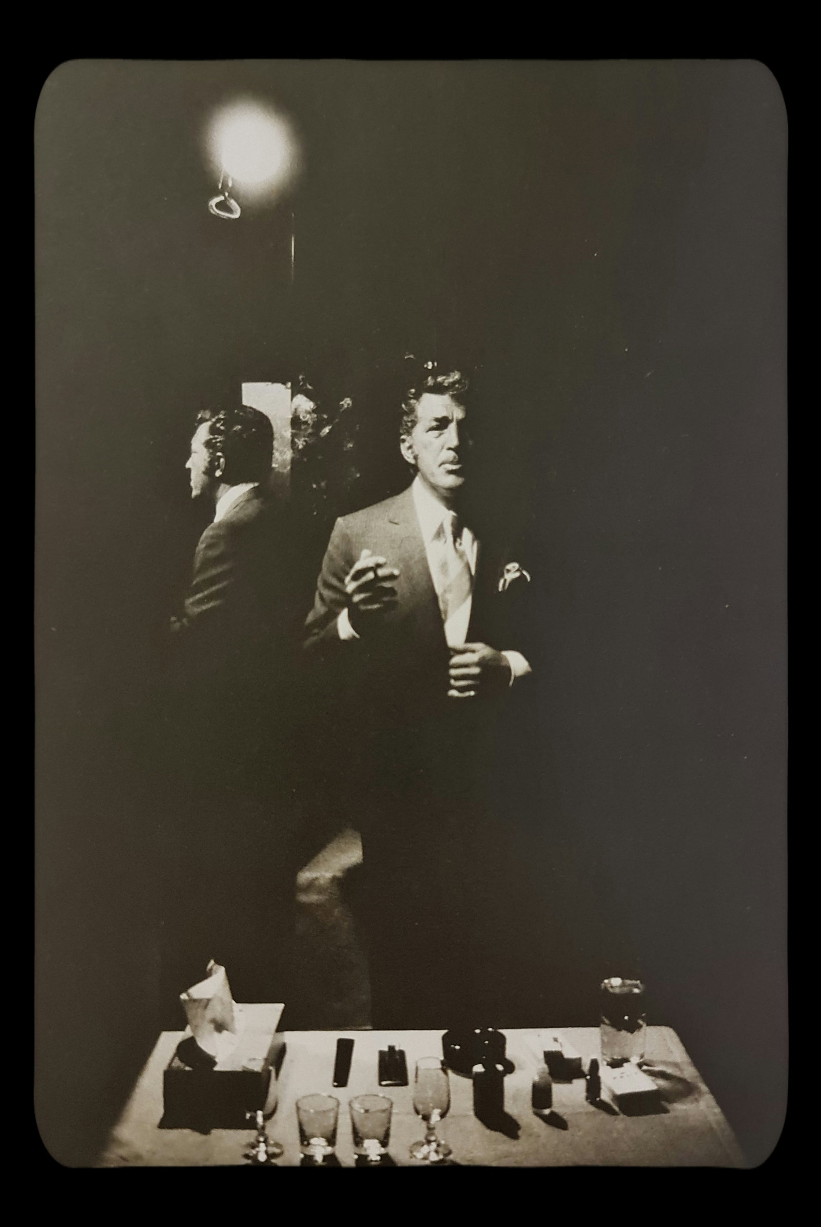 Terry O'Neill, Dean Martin Preparing To Go On Stage At A Las Vegas Night-Club, 1971: Photographer: Terry ONeill was a British photographer, known for documenting the fashions, styles, and celebrities of the 1960s. Title: Dean Martin preparing to go on stage at a Las Vegas night-club D