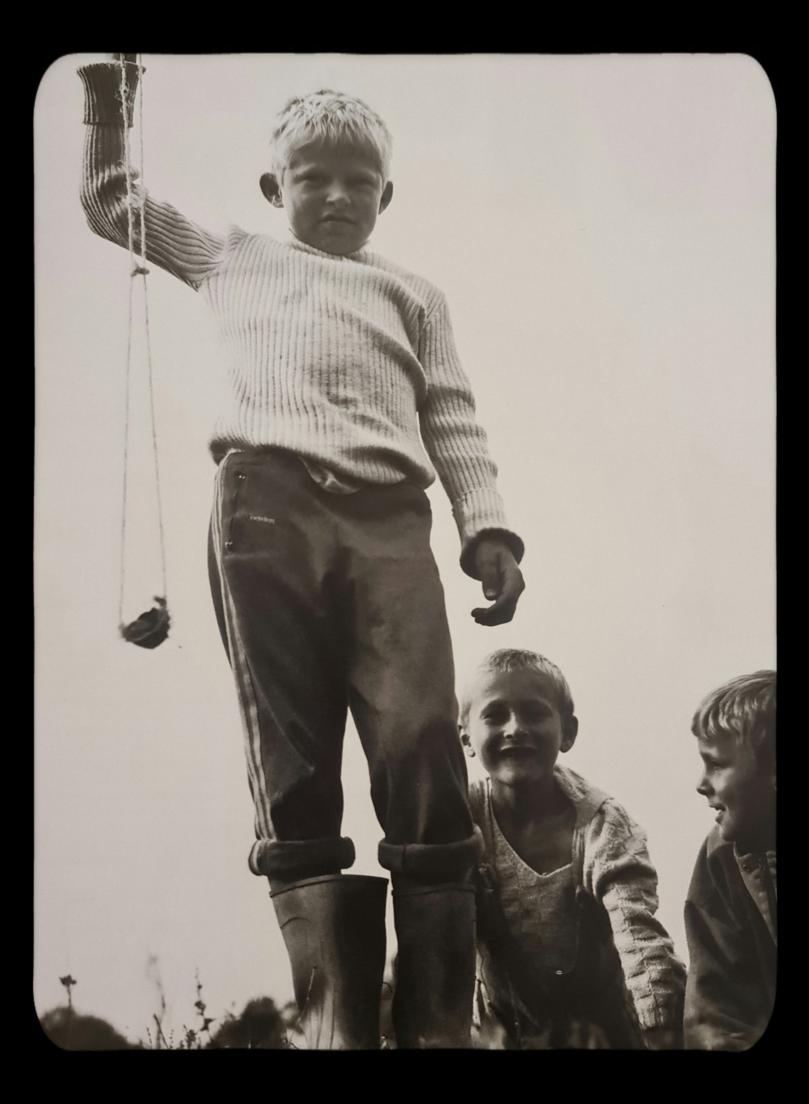 Michel Compte, Boy playing with a sling in Bosnia, 1996: Photographer: Michel Comte (born 19 February 1954) is a Swiss artist, filmmaker, fashion and portrait photographer. Subject/Title: Frida Kahlo Date Of Negative: 1996 Type Of Print: Sheet Fed Photograv