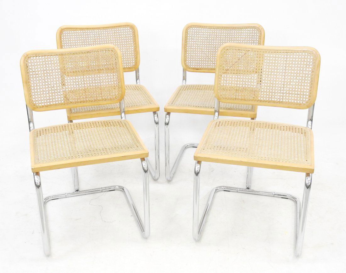 Marcel BREUER (1902-1981) d'aprÃ¨s : Suite de quatre chaises type B32 Ã structure tubulaire en: Marcel BREUER (1902-1981) d'aprÃ¨s : Suite de quatre chaises type B32 Ã structure tubulaire en mÃ©tal chromÃ© et bois, assises et dossiers Ã fonds de canne. 80 x 47 x 50 cm. Usures