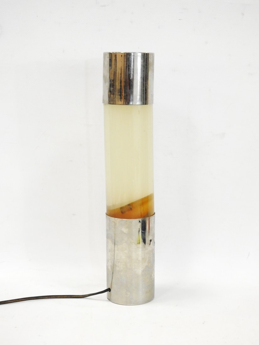 LAMPE tube LAVA en mÃ©tal chromÃ© et verre. Circa 1970. H.: 37 cm. Usures (en Ã©tat de: LAMPE tube LAVA en mÃ©tal chromÃ© et verre. Circa 1970. H.: 37 cm. Usures (en Ã©tat de fonctionnement)