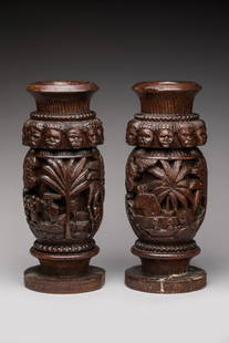 MADAGASCAR.: MADAGASCAR.Bois exotique patine.Deux grands vases en bois au decor exterieur richement ouvrage.Haut : 34,5 cm.Restaurations.Provenance : Collection privee, Conde-sur-Lâ€™escaut.