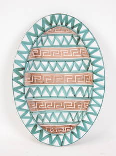 Robert PICAULT (1919 - 2000): Plat ovale en ceramique a decor de frises de chevrons. Long 37 - Larg: Robert PICAULT (1919 - 2000): Plat ovale en ceramique a decor de frises de chevrons. Long 37 - Larg 26 cm. Petit fele et eclat.