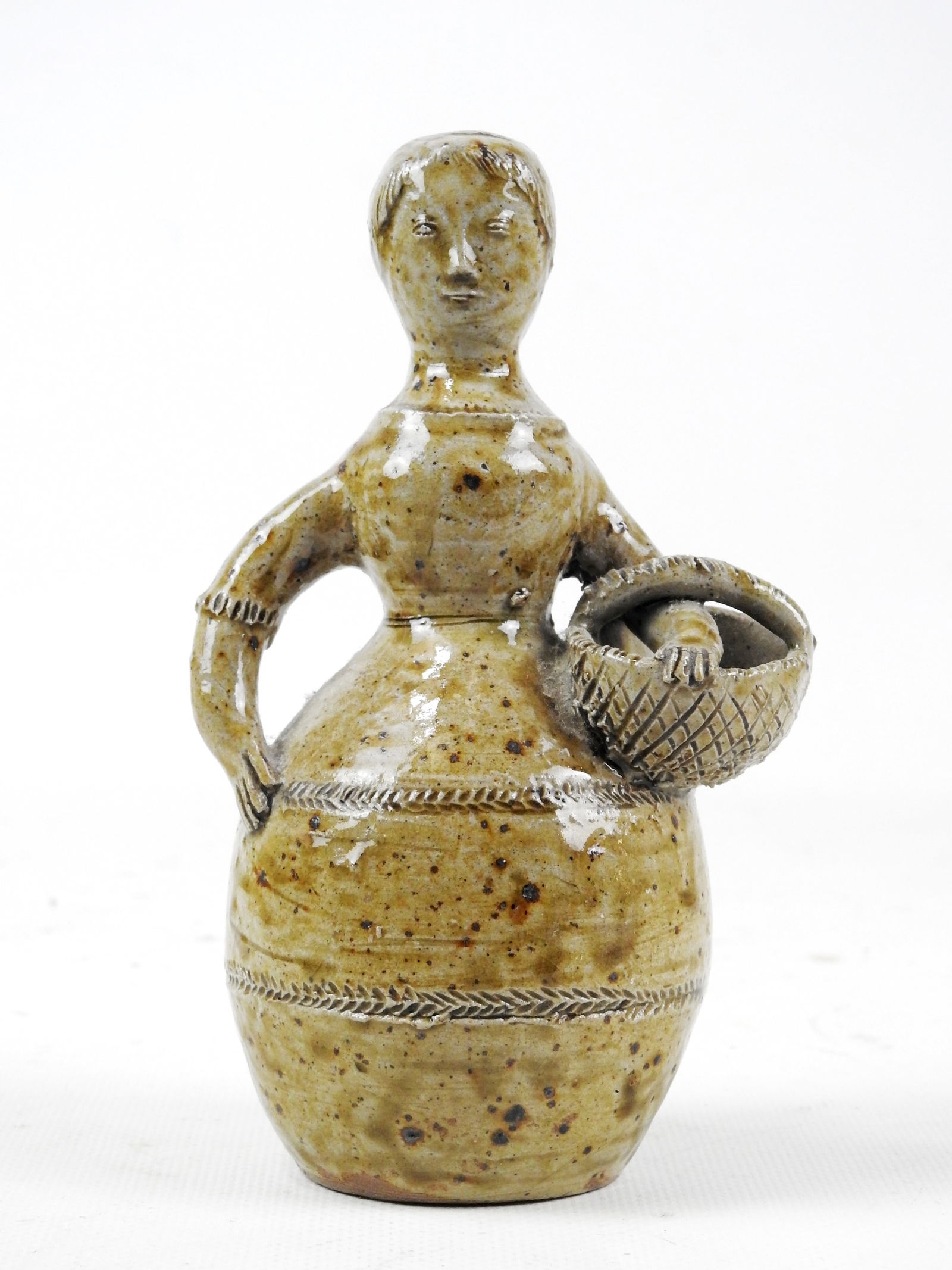 Jean LERAT (1913-1992) : Statuette en gres de la Borne representant une femme en panier. Signe: Jean LERAT (1913-1992) : Statuette en gres de la Borne representant une femme en panier. Signe J.Lerat. Haut : 18 cm