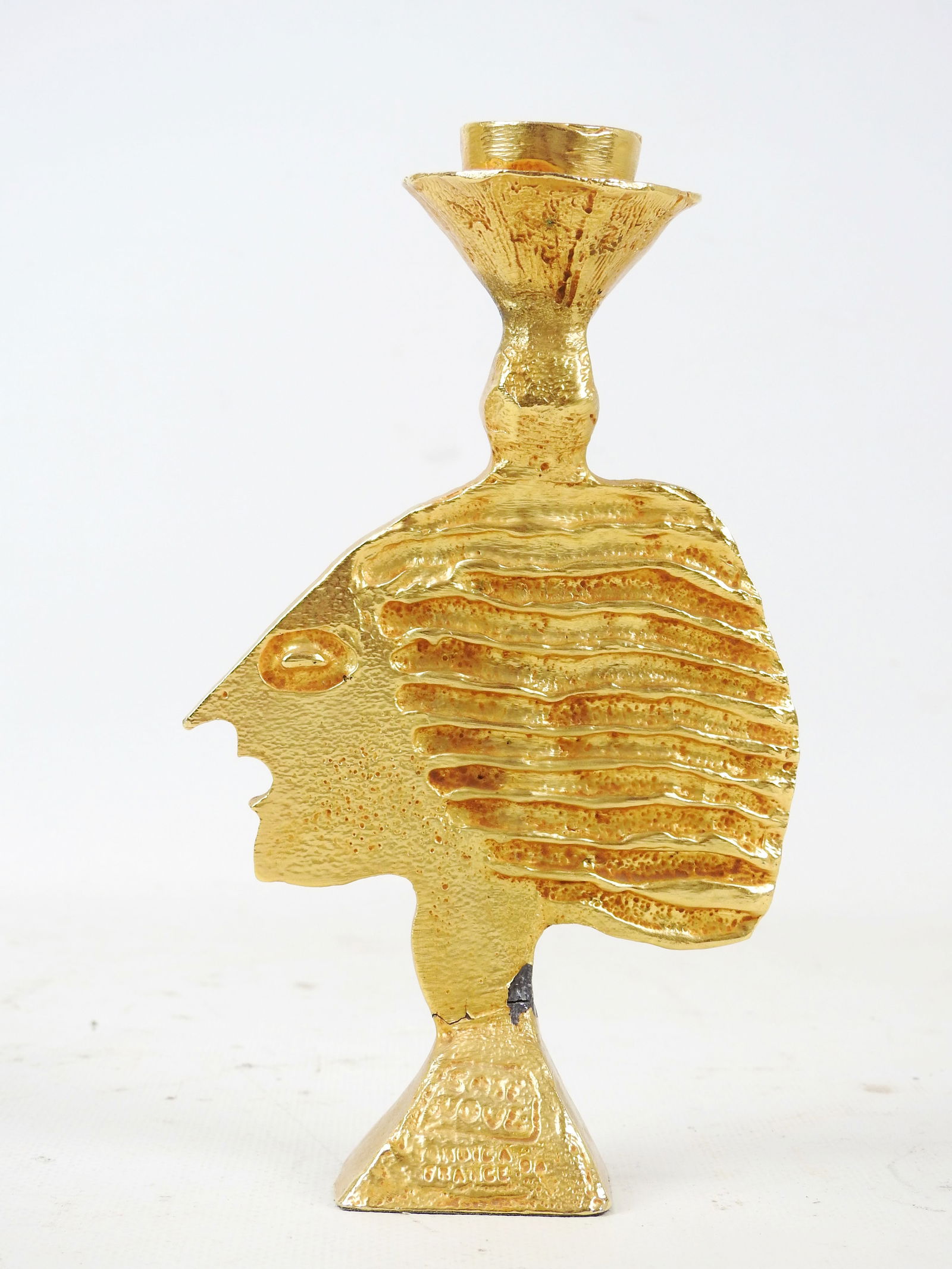 Pierre CASENOVE (ne en 1943) pour Fondica. Bougeoir en fonte dore a motif d'un profil de tete de (1 of 5)