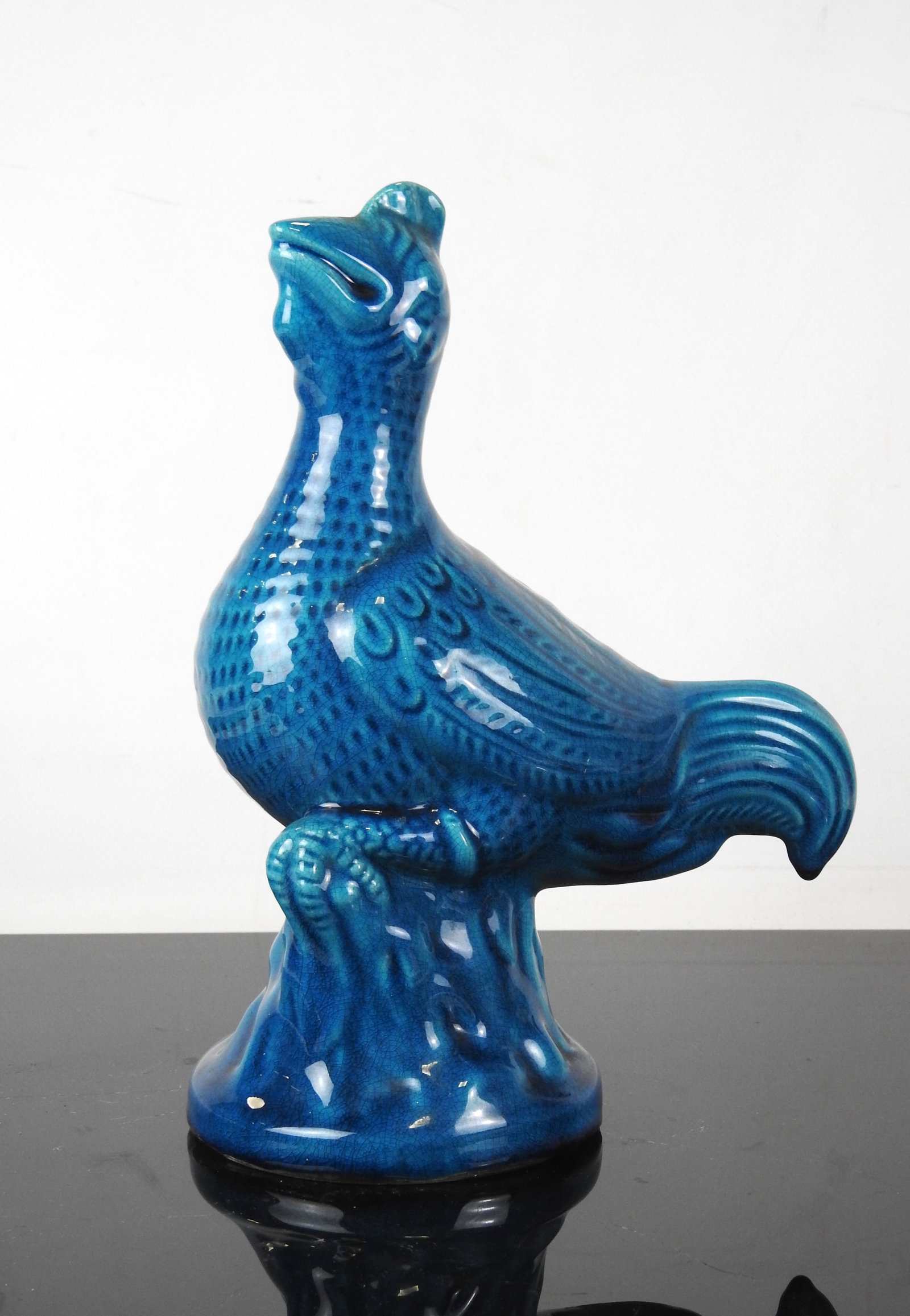 POL CHAMBOST (1906-1983) Oiseau en ceramique email: POL CHAMBOST (1906-1983)Oiseau en ceramique emaillee turquoise H: 30 cmPetit manque d email sous la queue