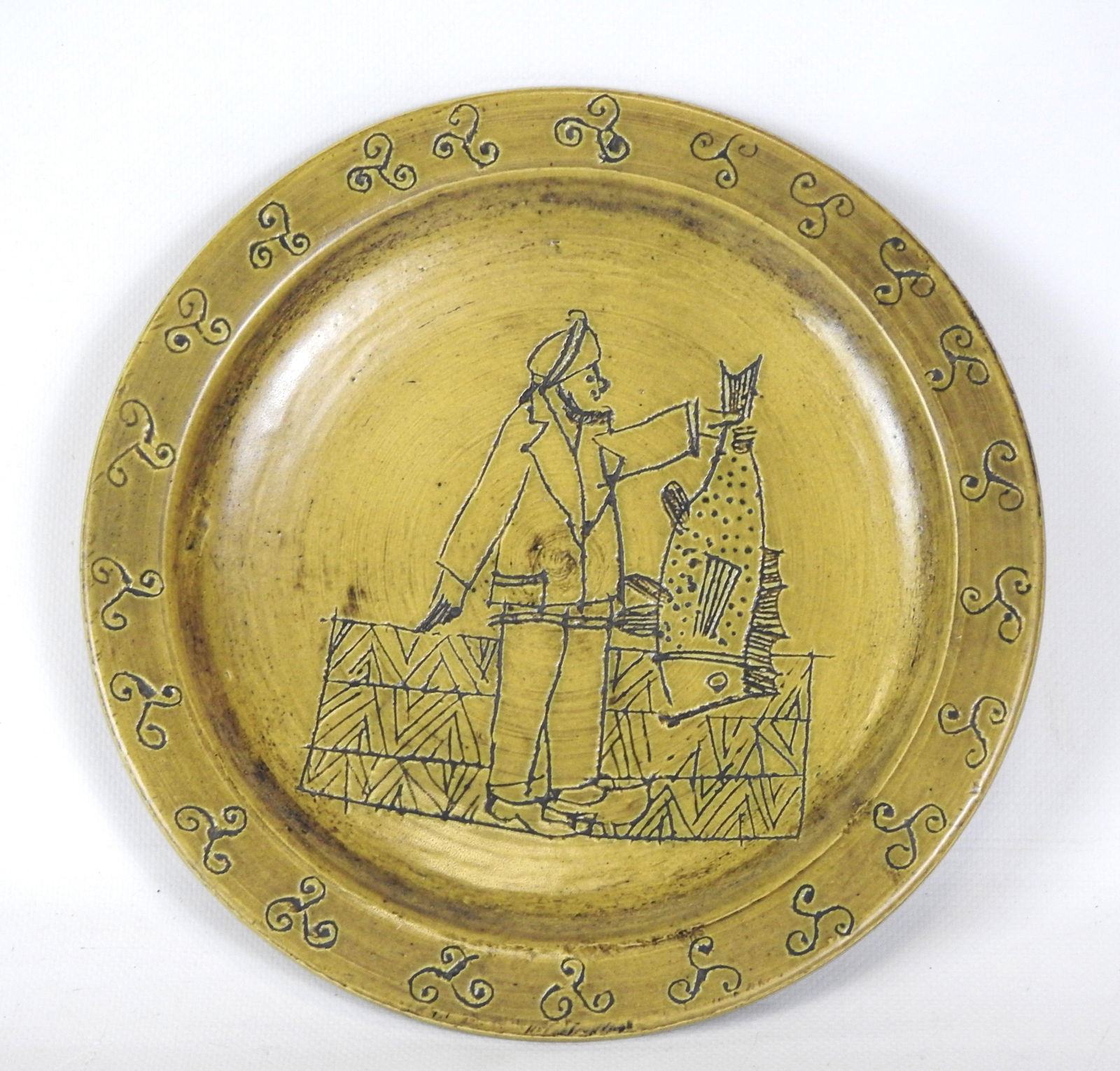 Jacques BLIN (1920-1995): Pecheur Assiette en ce: Jacques BLIN (1920-1995): Pecheur Assiette en ceramique. Signe au revers.Diam : 28.5 cm(infime eclat au revers)