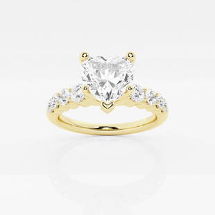 1 1/3 ctw Heart Diamond Graduated Engagement Ring 14K Yellow Gold: Lab Grown 1 1/3 ctw Heart Diamond Graduated Engagement Ring 14K Yellow Gold Style: Side Stone Engagement Ring Total Carat Weight: 1 1/3 ctw Centerstone Carat Wt: 0.75 Centerstone Count: 1