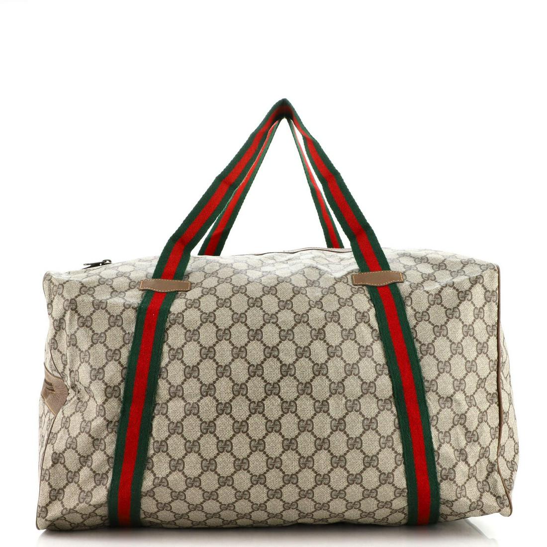 Gucci Web Trim Weekend Duffle Bag GG Coated Canvas Medium: Gucci Web Trim Weekend Duffle Bag GG Coated Canvas Medium Exterior Color: Brown Interior Color: Brown Exterior Material: Canvas Coated Interior Material: Fabric Hardware Color: Gold Accessories: E
