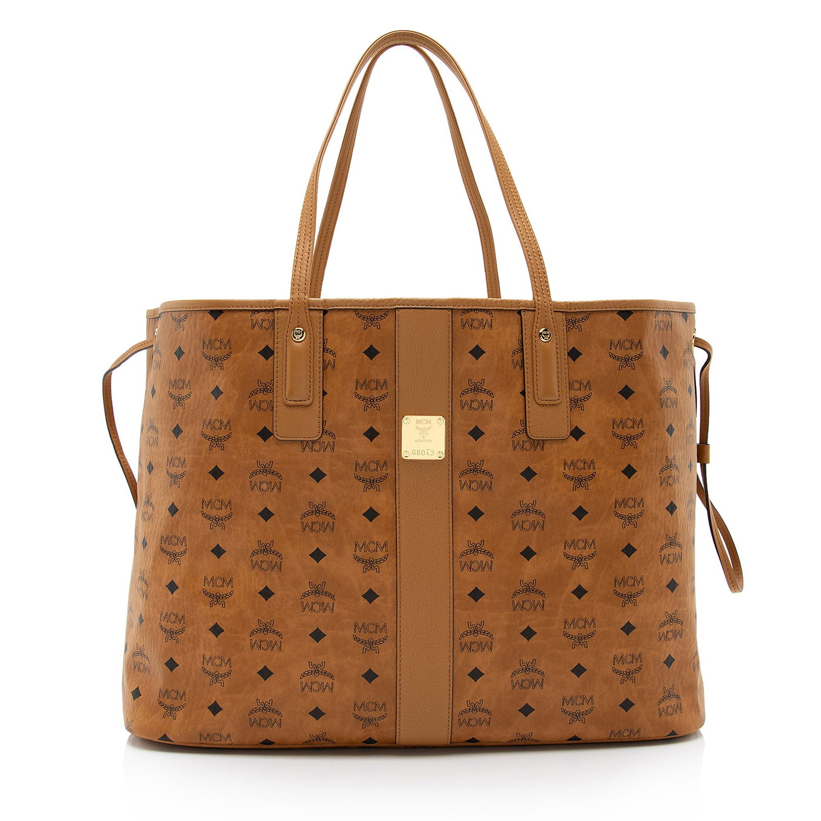 MCM Visetos Liz Reversible Large Shopper Tote: MCM Visetos Liz Reversible Large Shopper Tote Condition Quality: Good Color: Brown Height: 13 in. Length: 17 in. Material: Coated Canvas/Leather Width: 7 in. Item Condition: Pre Owned <br