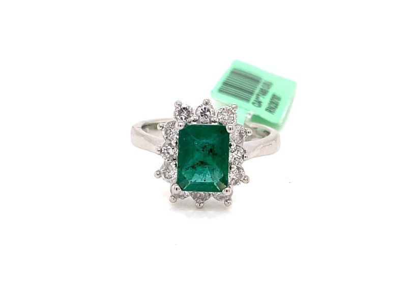 Emerald-Cut Emerald and Diamonds Floriated Halo Ring In 14K White Gold: Emerald-Cut Emerald and Diamonds Floriated Halo Ring In 14K White Gold Product Code: 14KWHITEGO-62840A9EDB81F Condition: Never Worn Final Sale: THIS ITEM IS FINAL SALE AND NOT RETURNABLE.
