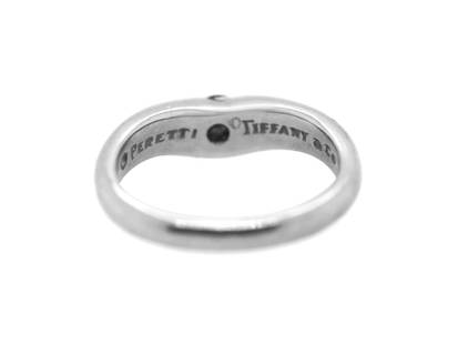 Tiffany & Co. Platinum Elsa Peretti Solitaire Diamond Curved Band Ring: Tiffany & Co. Platinum Elsa Peretti Solitaire Diamond Curved Band Ring Product Code: TIFFANY&CO-619287C100347 Brand: Tiffany & Co. Condition: Pre-Owned Metal: platinum Stone: diamond