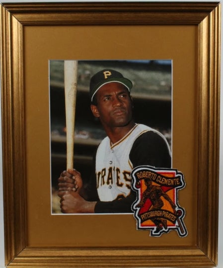 Roberto Clemente Pirates 14x17 Custom Framed Photo Display with Vintage Commemorative Pirates Cloth: Roberto Clemente Pirates 14x17 Custom Framed Photo Display with Vintage Commemorative Pirates Cloth Patch This is a Roberto Clemente Pittsburgh Pirates 13.5x16.5 Custom Framed and Matted Photo Display