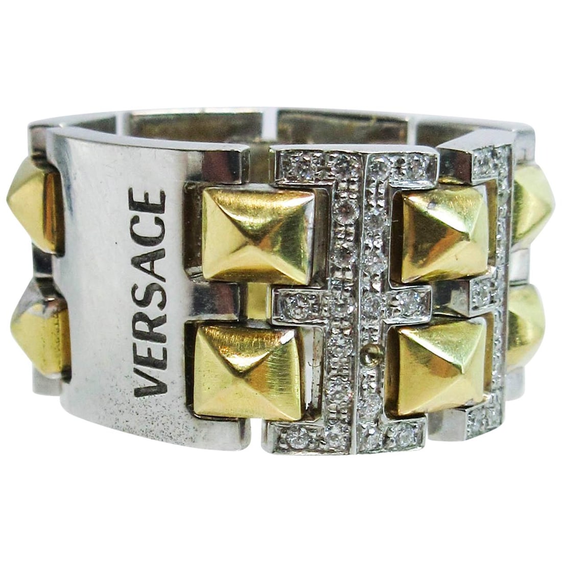 Versace 18 Karat White and Yellow Gold with Diamond Accents: Versace 18 Karat White and Yellow Gold with Diamond Accents Metal: 18k Gold Stone: Diamond Period: 21st Century Date of Manufacture: 21st Century Condition: Excellent Wear consistent with age and use.