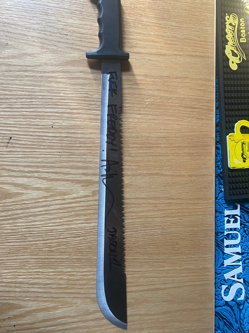 jason voorhees signed machete (real): jason voorhees signed machete (real) Jason Voorhees (Ari Lehman) signed machette , with F**k Freddy inscribed