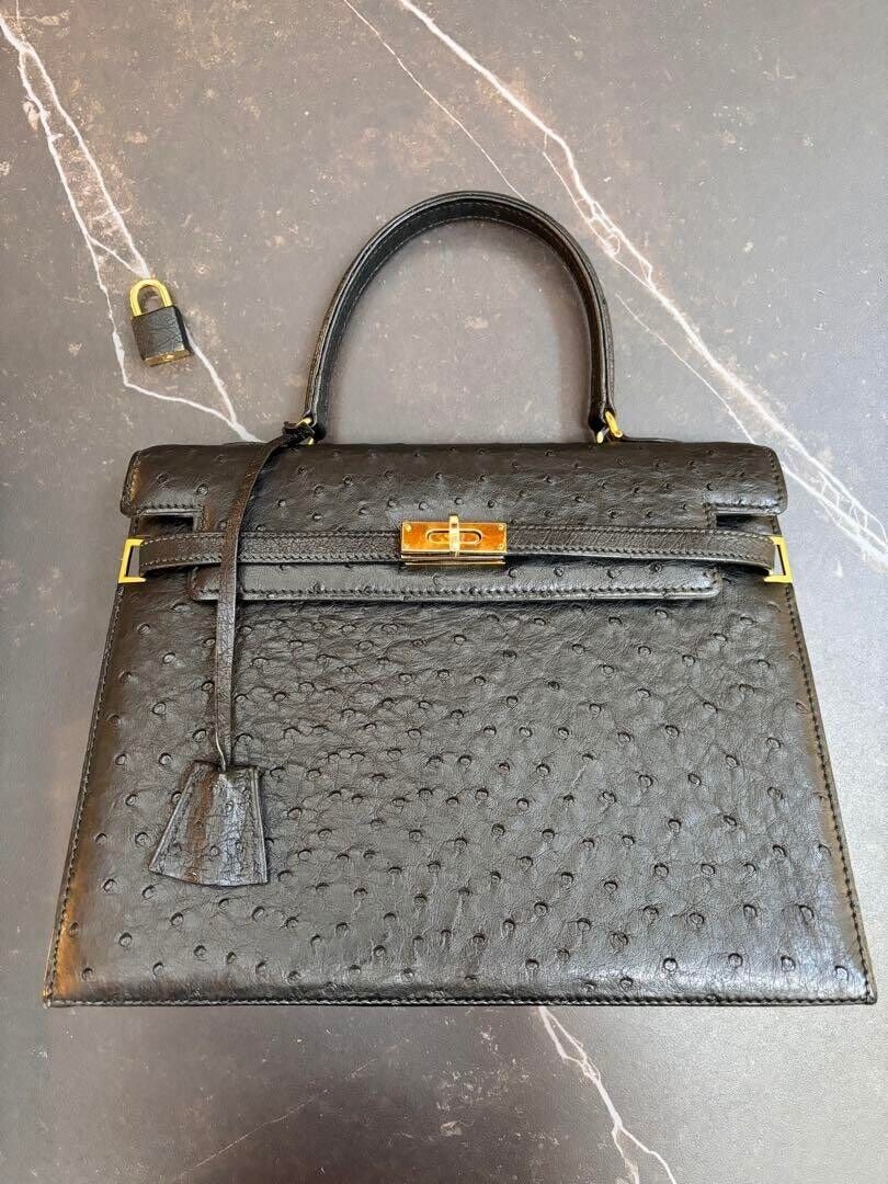 Morabito Bag Scara 28 Ostrich Black: Morabito Bag Scara 28 Ostrich Black Gold Leather Handbag Used Condition: Pre-owned Seller Notes: ?It is a Morabito Scala 28, ostrich. The color is black. It is 28.5 cm wide, 10 cm deep, and 20 cm ...