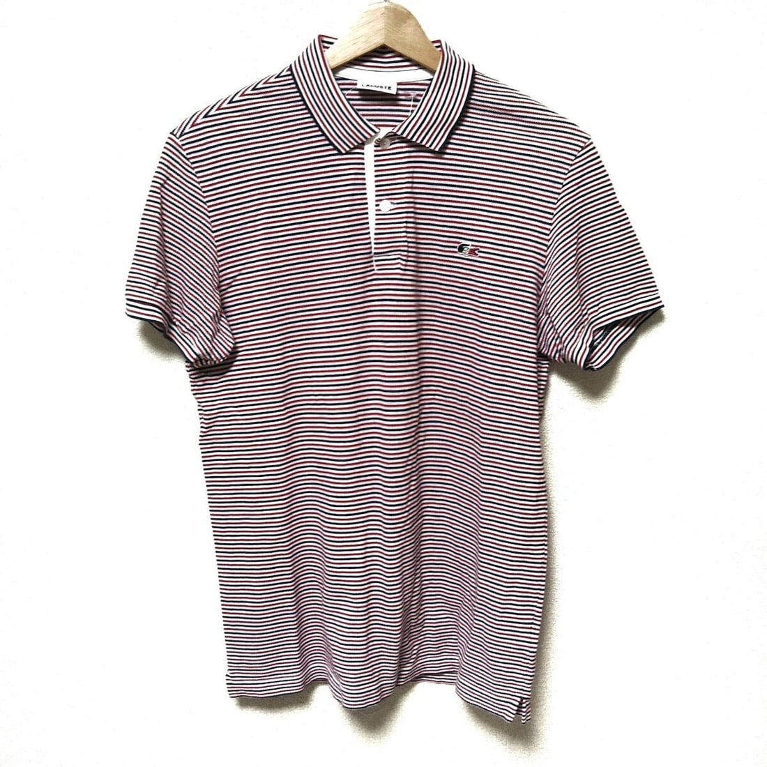 Auth Lacoste - White Red Dark: Auth Lacoste - White Red Dark Navy Polo Shirt Condition: Pre-owned Brand: Lacoste Style: Polo Shirt Color: White, Red, Dark Navy Material: Please see the photo of the quality tag ConditionRank: 7
